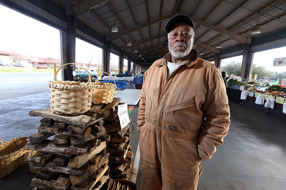 artist with baskets